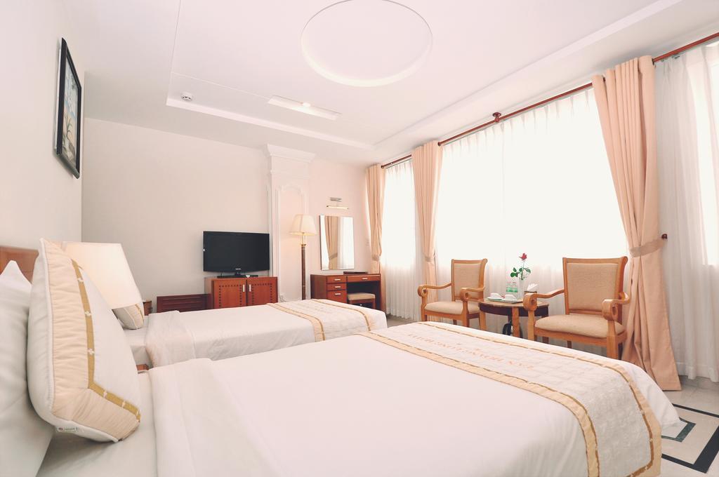 Tan Hoang Long Hotel Ho Şi Min Oda fotoğraf